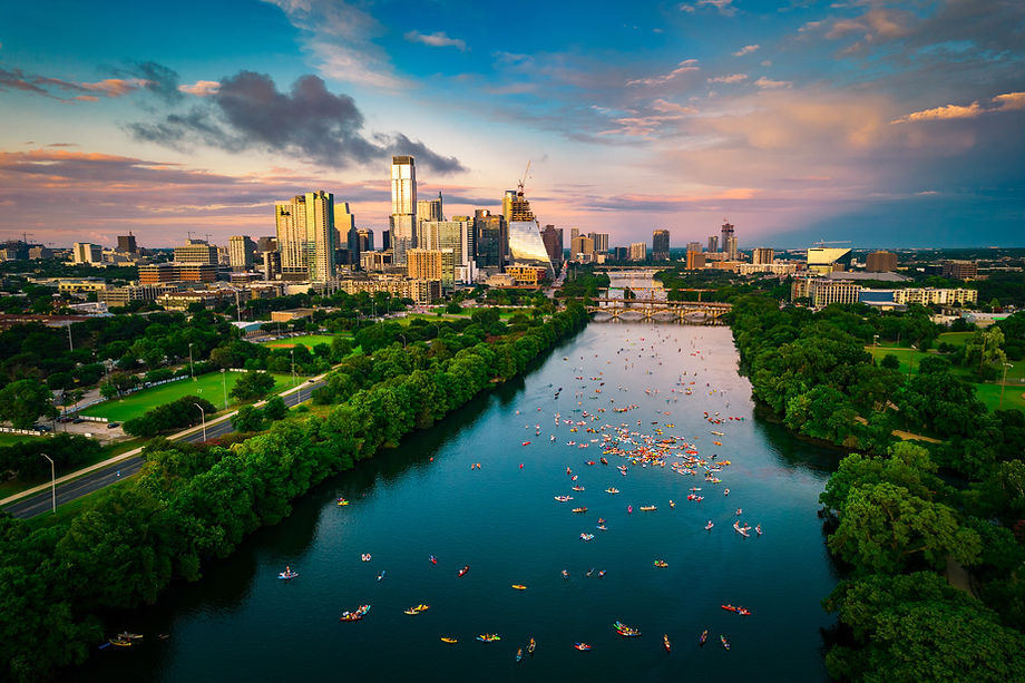 colorful skyline at golden hour blue and pink clouds over Austin Texas USA, where IronBridge Private Wealth offices