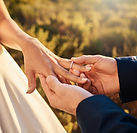 Hands showing a couple getting engaged, as an example of a life event that IronBridge can help navigate through financial changes.